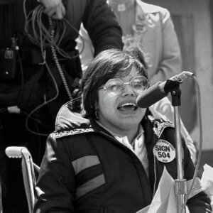 A black and white picture Judith E. Heumann at the 504 protests in the 70s. 