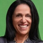 Nadine O. Vogel, Springboard Consulting, CEO, headshot White woman with brown hair and green eyes